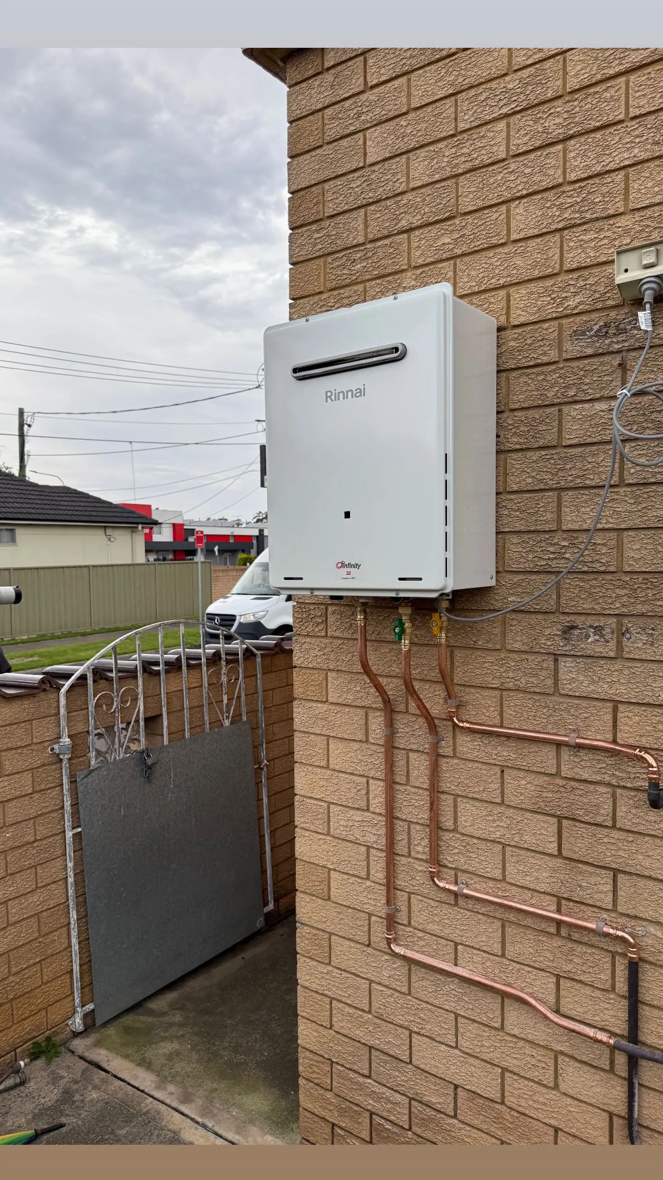 Rinnai gas hot water unit installed by OPS on a Concord property