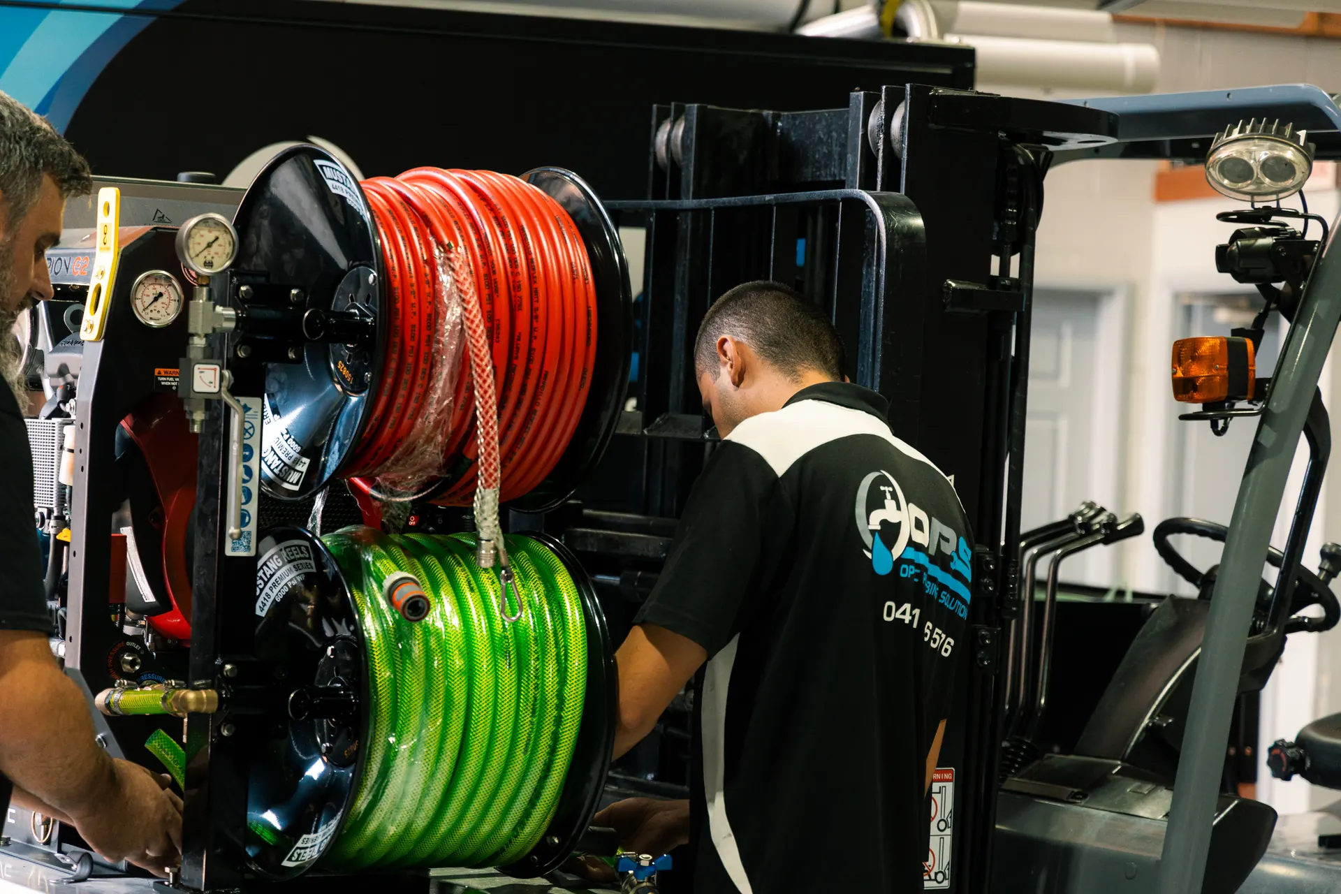 Jere Skorin servicing OPS jet blasting equipment in the workshop